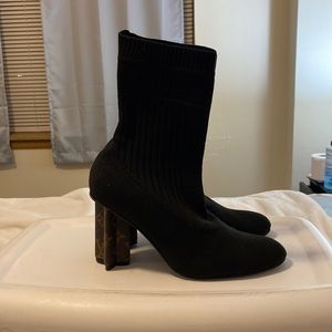 Black sock boots with brown heel